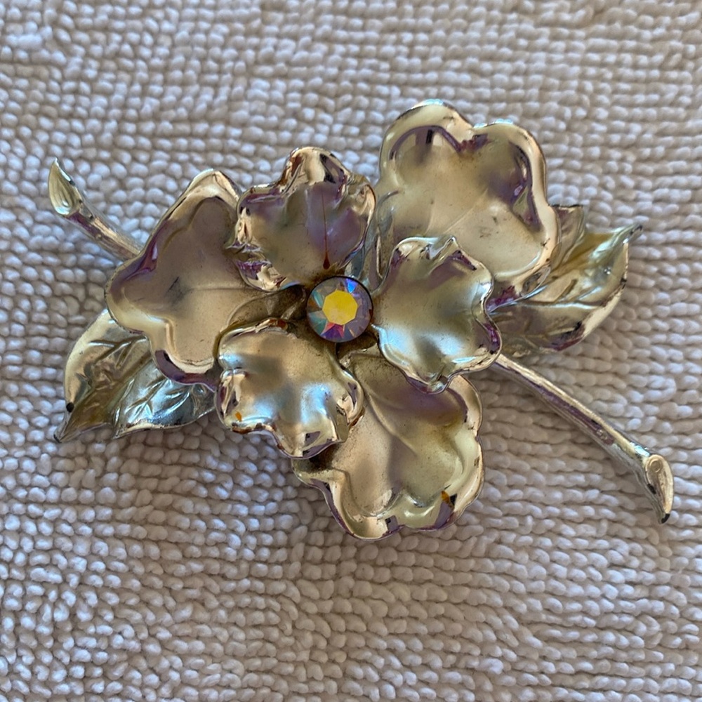 Silver toned brooch
